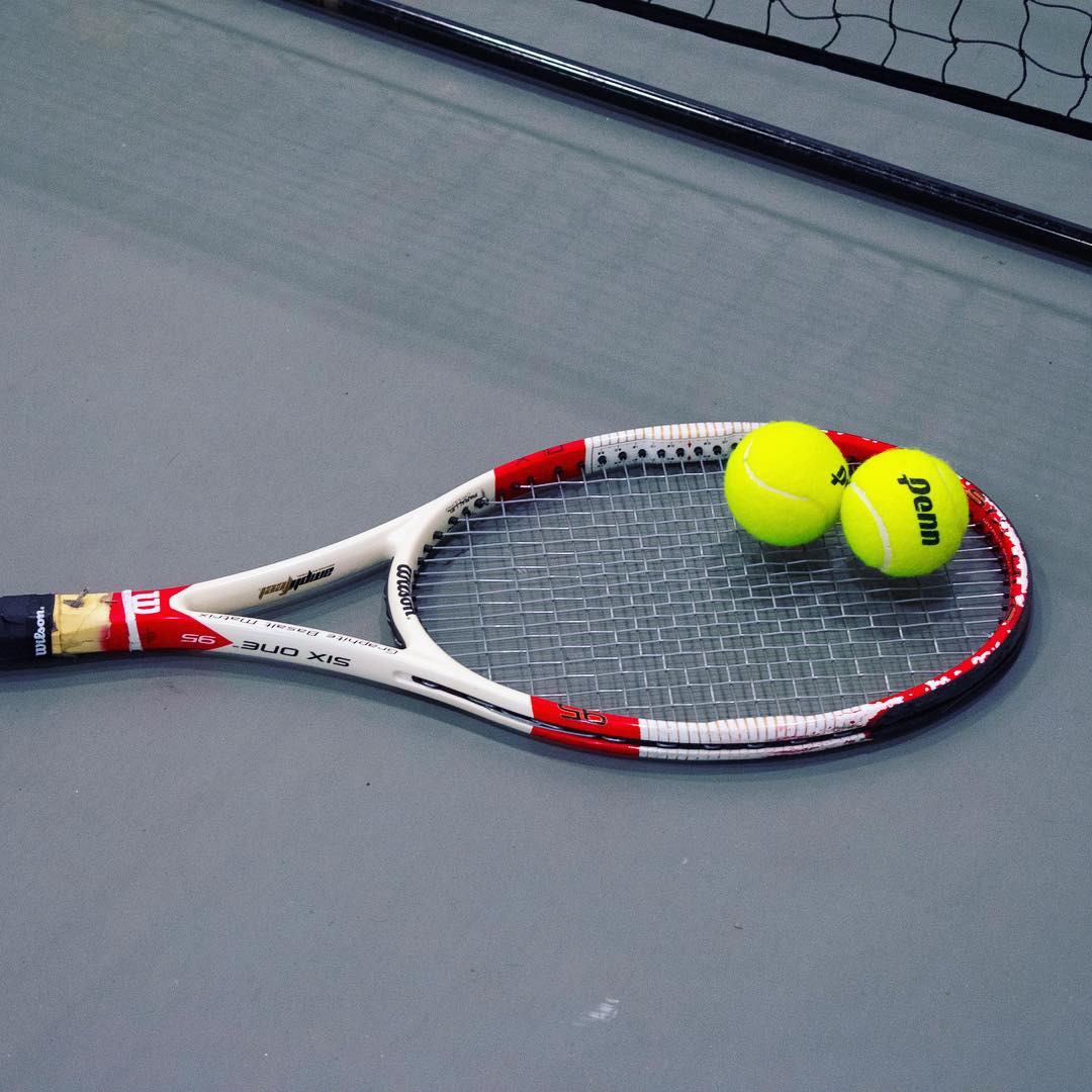 Tennis racket and balls